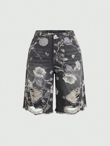 Women's loose wide-leg denim Bermuda shorts featuring vintage animal and paisley print with pockets and zipper fly.