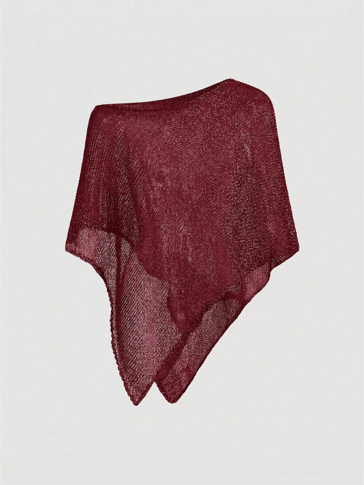 Women's casual hollow knit poncho top with boat neck, cloak sleeves, and asymmetrical hem