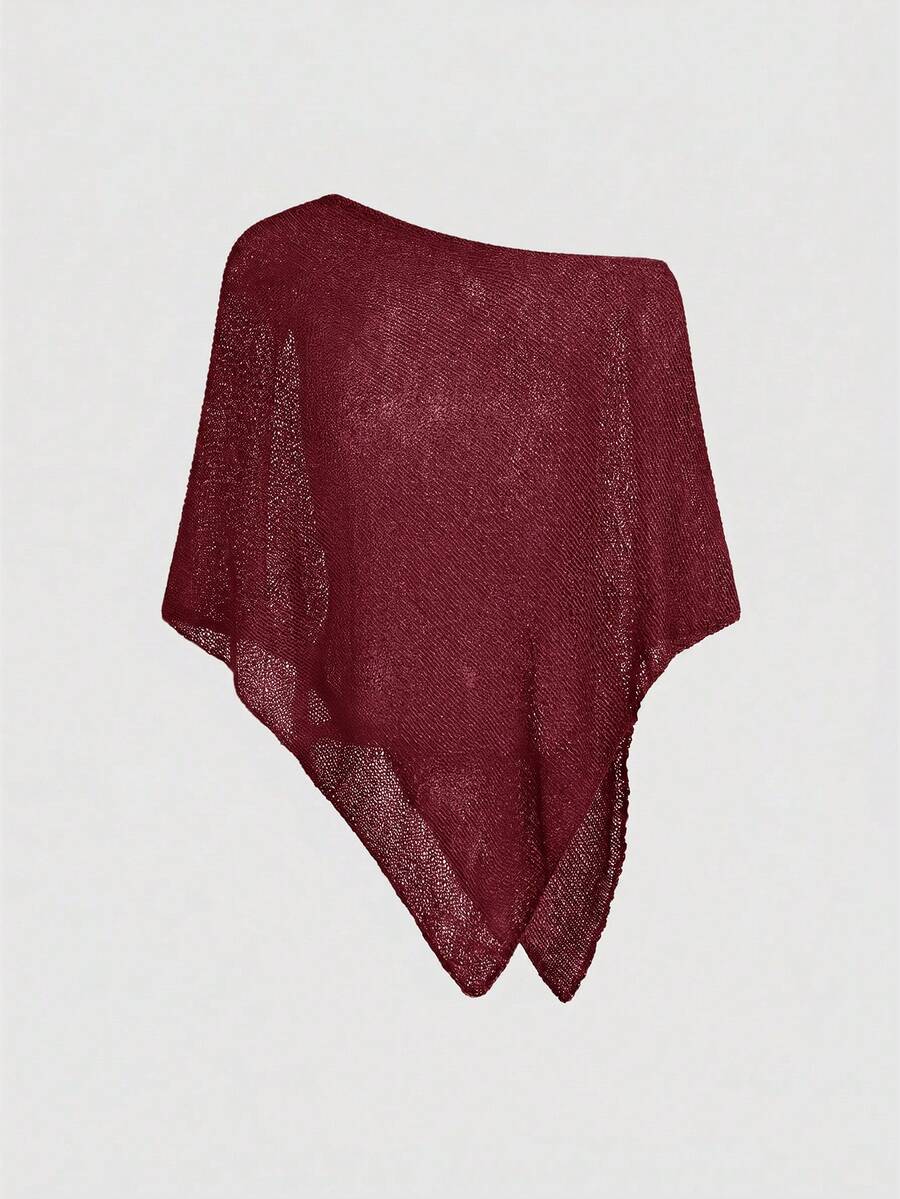 Women's casual hollow knit poncho top with boat neck, cloak sleeves, and asymmetrical hem