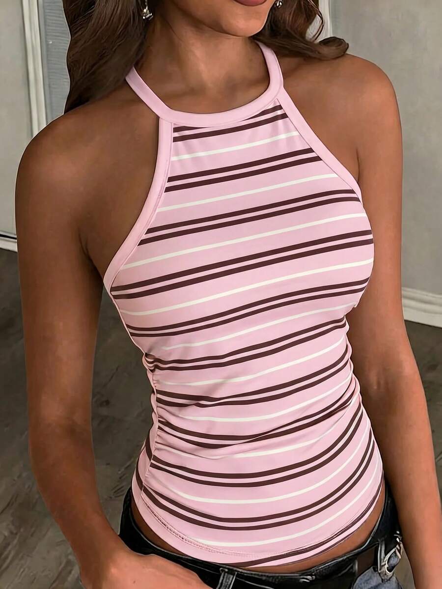 Multicolor women's graphic print halter tank top featuring a round neck, contrast binding, and backless design.
