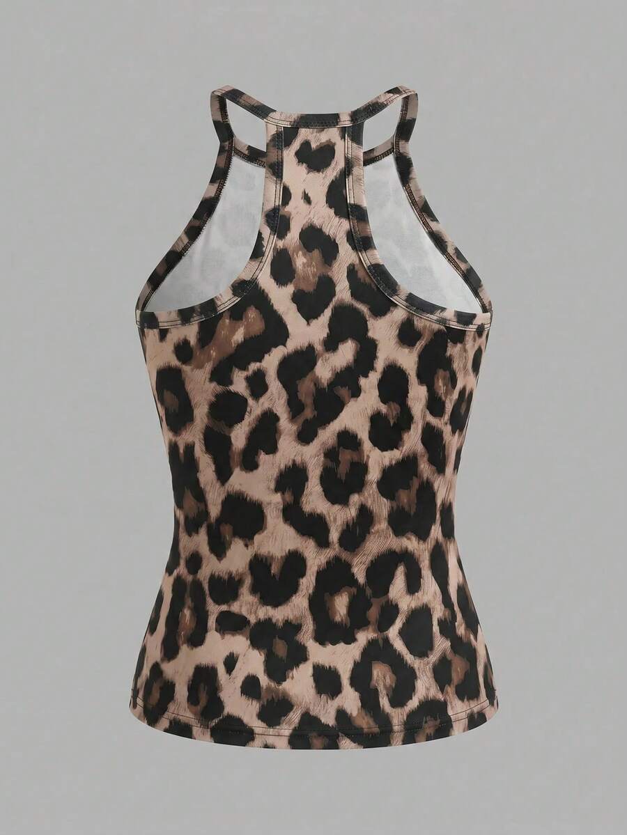 Multicolor women's graphic print halter tank top featuring a round neck, contrast binding, and backless design.