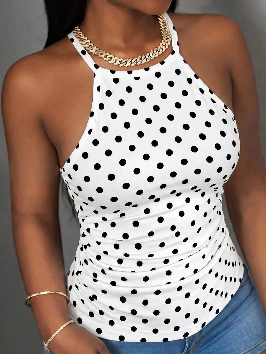 Multicolor women's graphic print halter tank top featuring a round neck, contrast binding, and backless design.