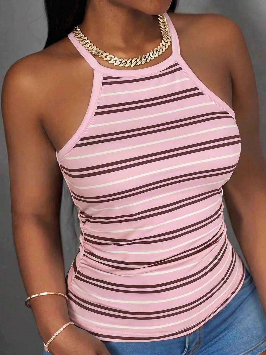 Multicolor women's graphic print halter tank top featuring a round neck, contrast binding, and backless design.