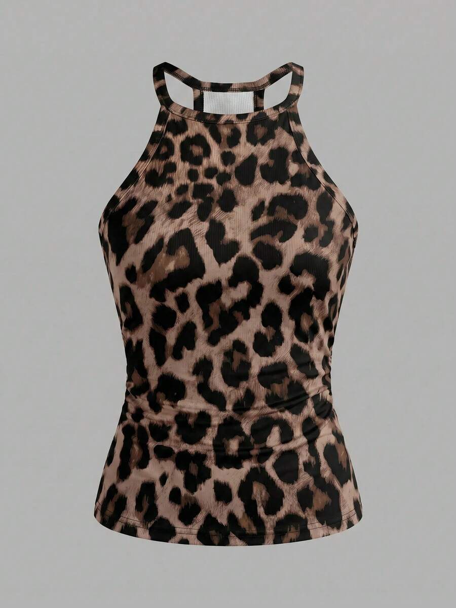 Multicolor women's graphic print halter tank top featuring a round neck, contrast binding, and backless design.