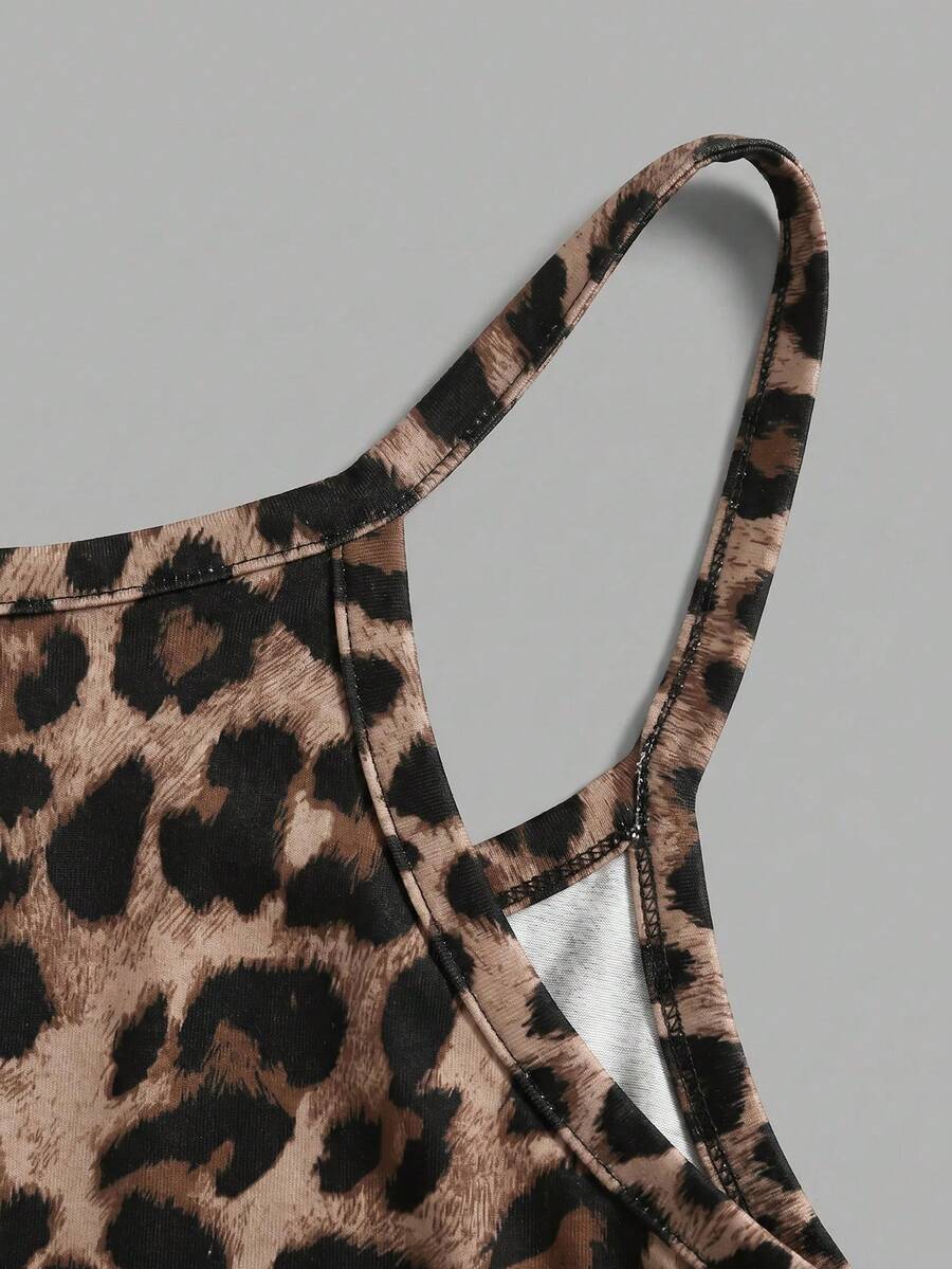 Multicolor women's graphic print halter tank top featuring a round neck, contrast binding, and backless design.