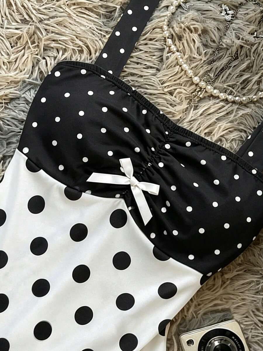 Multicolor Y2K slim fit crop top with wide straps, polka dot print, ruched shirred design, bow accents, and a flared ruffle hem.