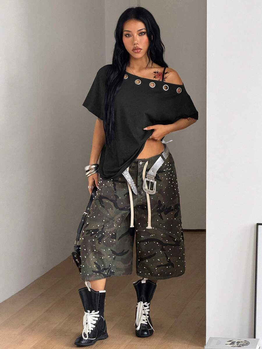 Women's casual loose fit cold shoulder cotton t-shirt with asymmetrical cutout neckline and short sleeves.
