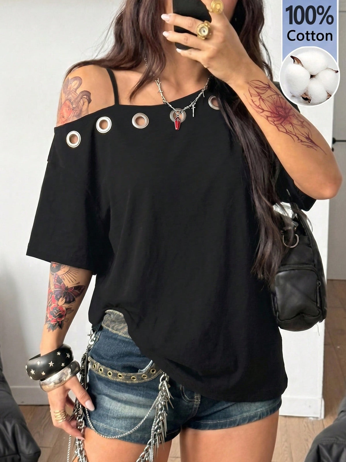 Women's casual loose fit cold shoulder cotton t-shirt with asymmetrical cutout neckline and short sleeves.