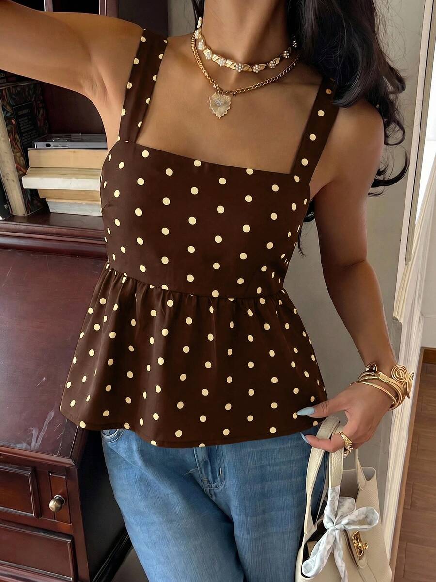Women's casual polka dot tank top with tie-front knot, strap neckline, backless design, and ruffle flared hem