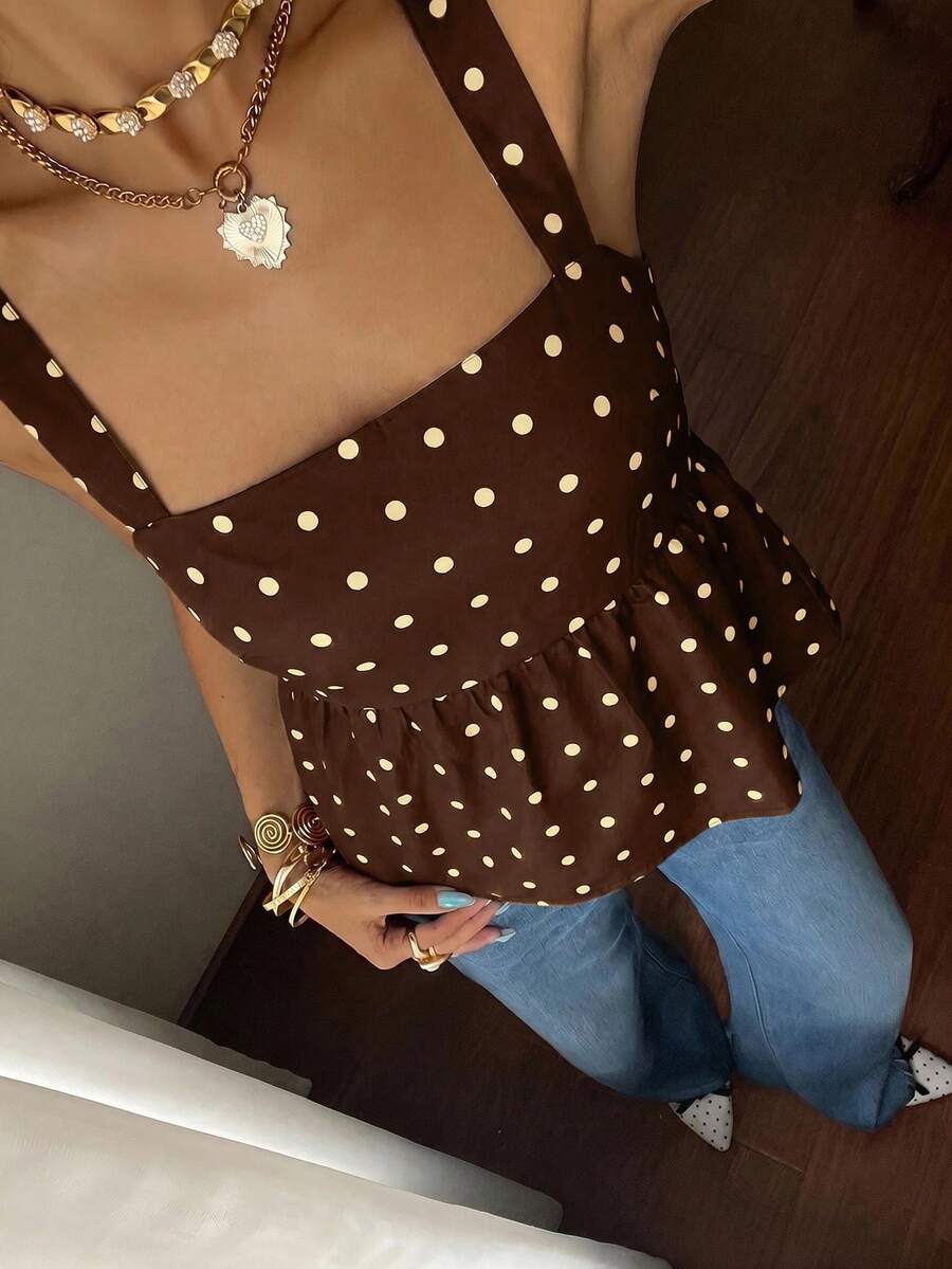 Women's casual polka dot tank top with tie-front knot, strap neckline, backless design, and ruffle flared hem