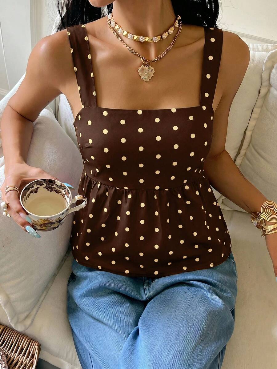Women's casual polka dot tank top with tie-front knot, strap neckline, backless design, and ruffle flared hem