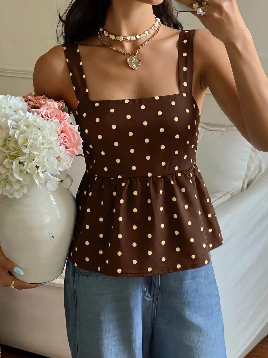 Women's casual polka dot tank top with tie-front knot, strap neckline, backless design, and ruffle flared hem