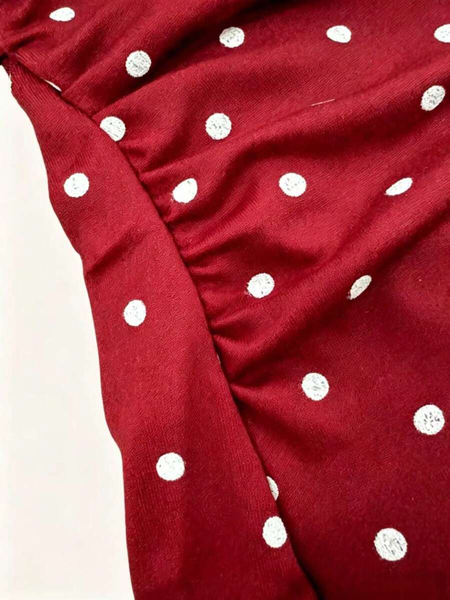 Women's cowl neck tie polka dot pleated tank blouse with ruched details and a regular fit