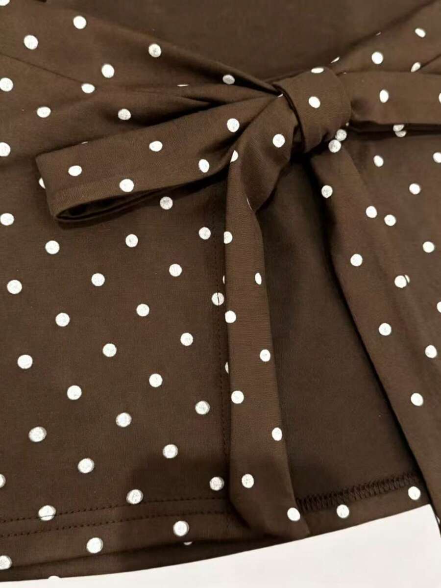 Women's cowl neck tie polka dot pleated tank blouse with ruched details and a regular fit