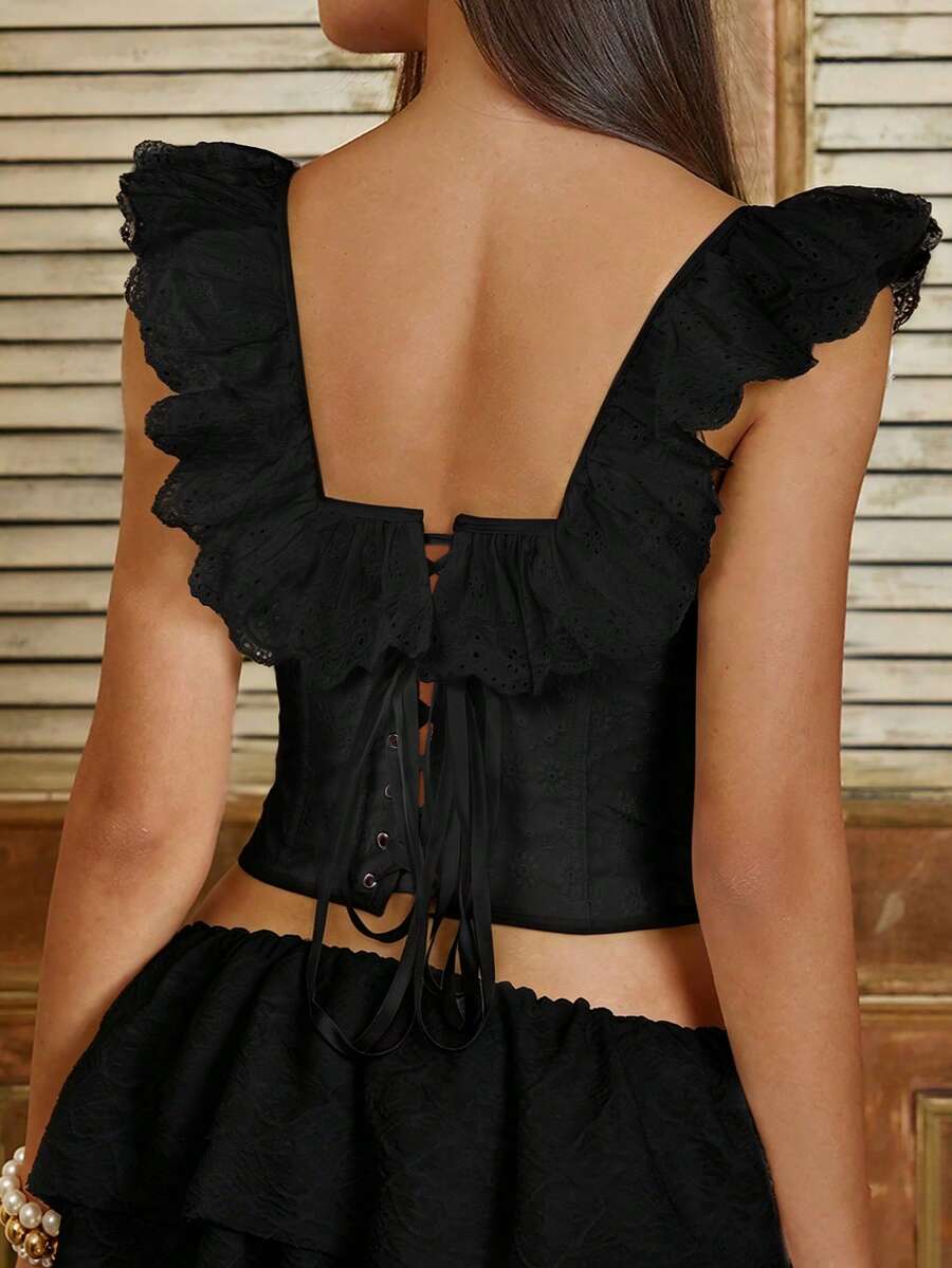 White sleeveless boned corset crop top featuring a square neckline and lace-up back detail.