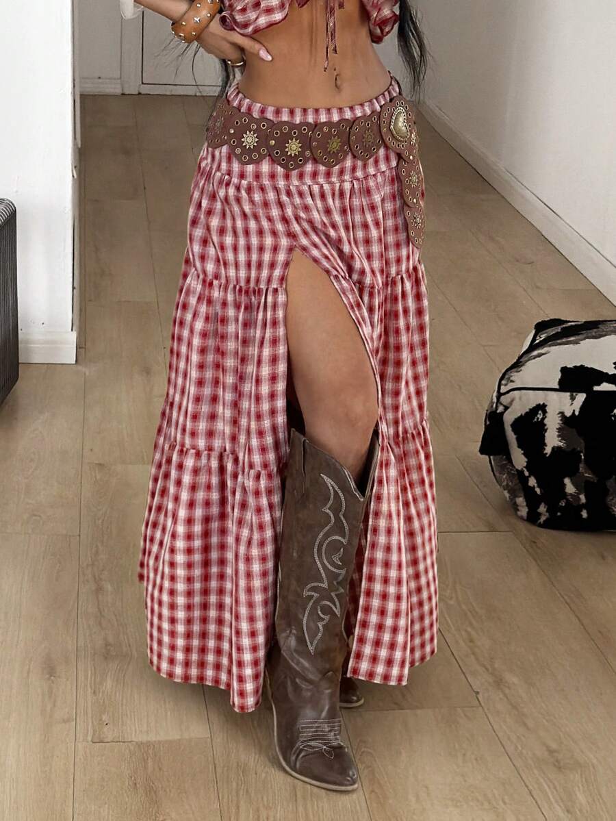 Women's red plaid long skirt featuring a low-rise waist and a side slit in lightweight woven fabric.