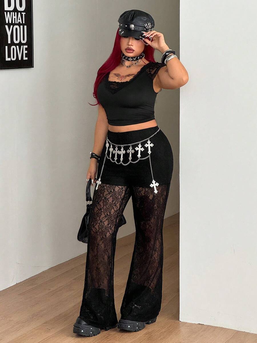 Women's plus size black flare leg pants with high elastic waist in stretchy knit fabric