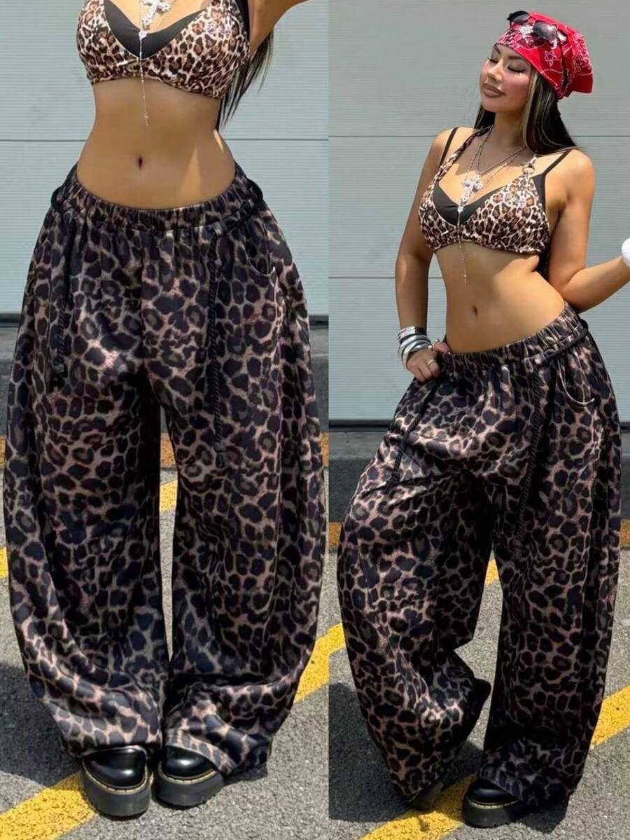 Women's casual grey plaid sweatpants featuring an elastic drawstring waistband, side pockets, and a relaxed loose fit.