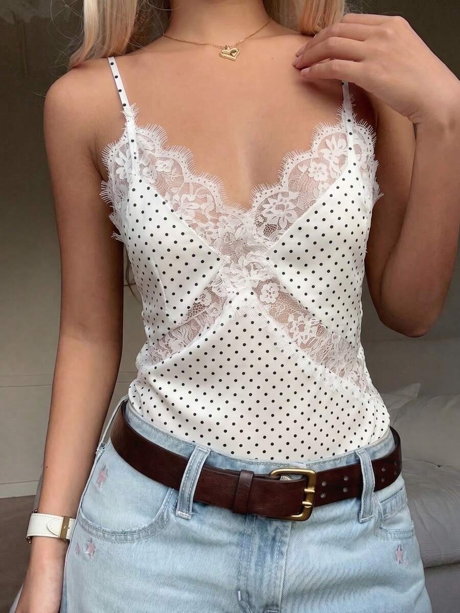 White satin design camisole tank top featuring contrast lace patchwork details and spaghetti straps.
