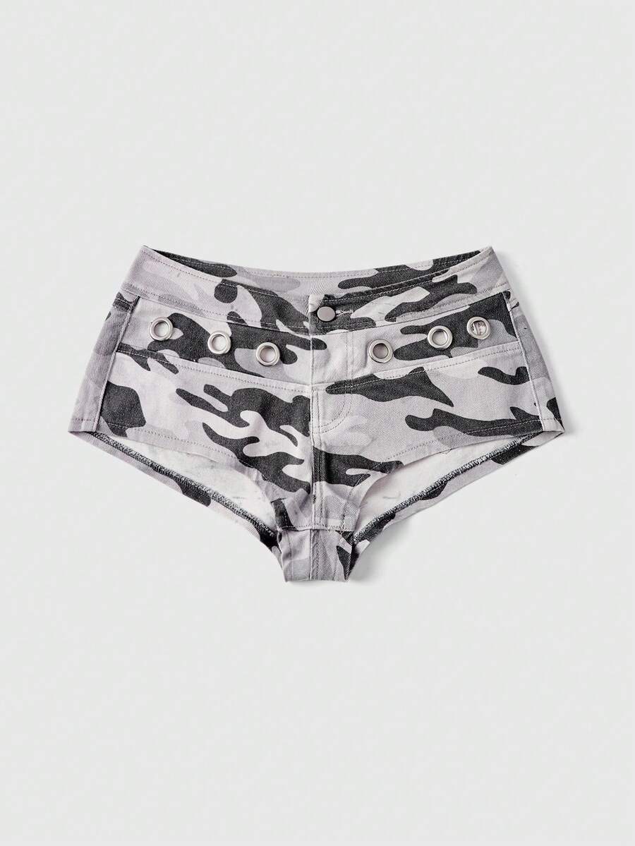 Women's ultra low waist camouflage mini skort shorts with zipper fly, button detail, and grommet eyelet accents.