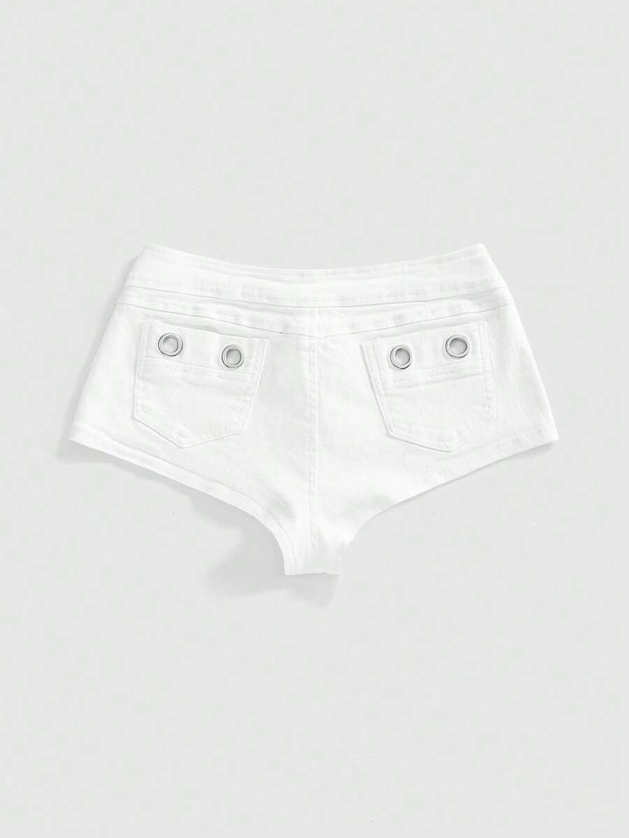 Women's ultra low waist camouflage mini skort shorts with zipper fly, button detail, and grommet eyelet accents.