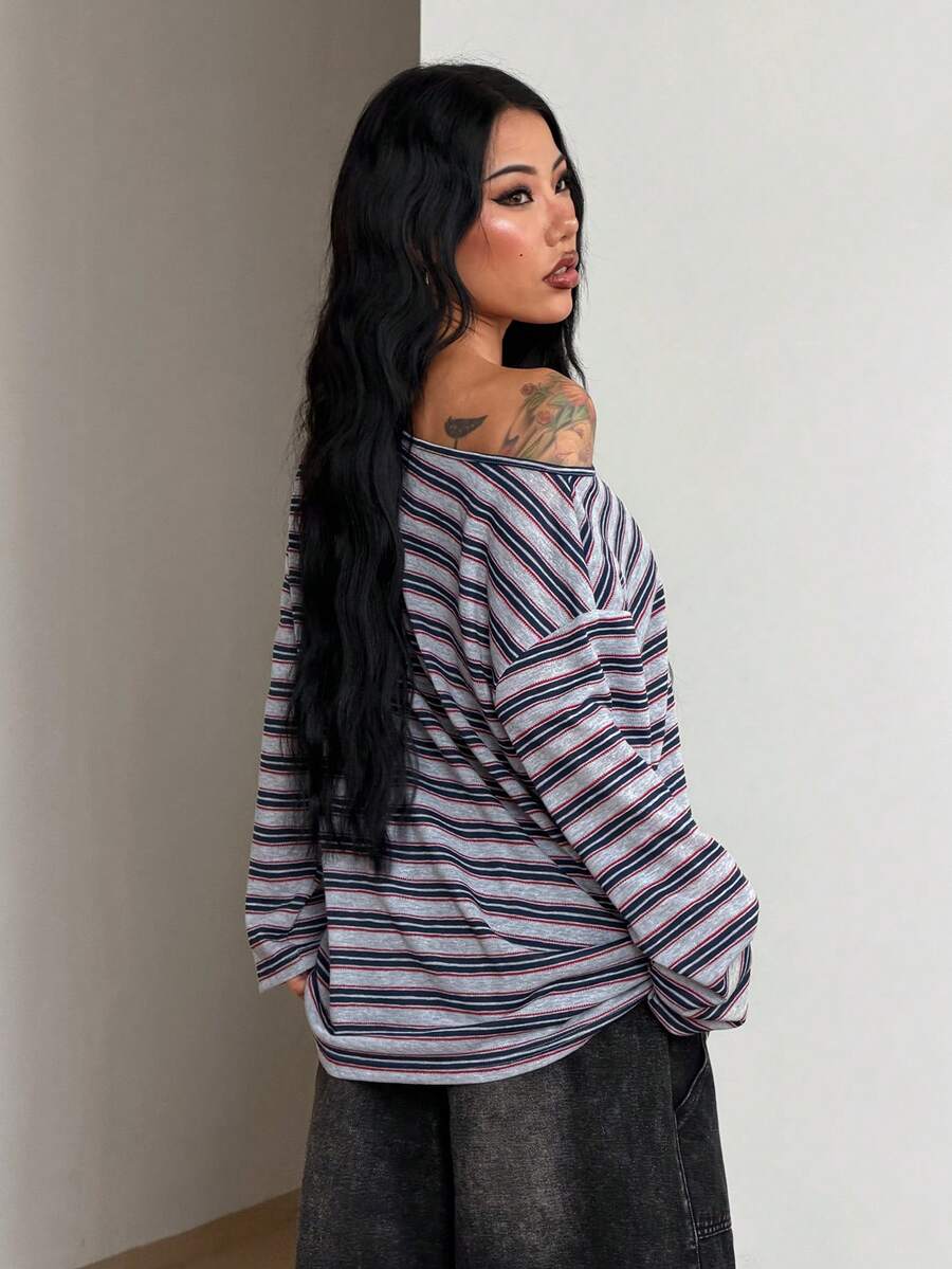 Women's brown striped boat neck long sleeve raglan T-shirt with a loose casual fit