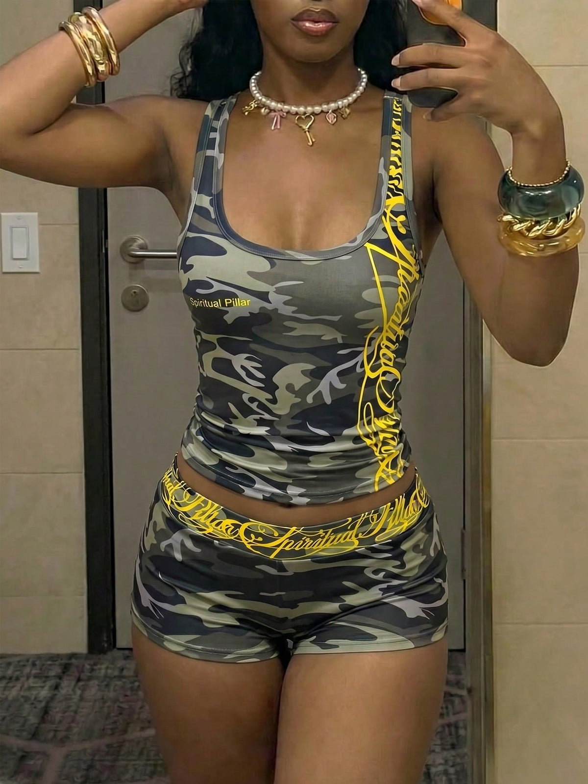 Women's Halloween print two-piece outfit with scoop neck camisole top and matching short biker track shorts in a slim fit