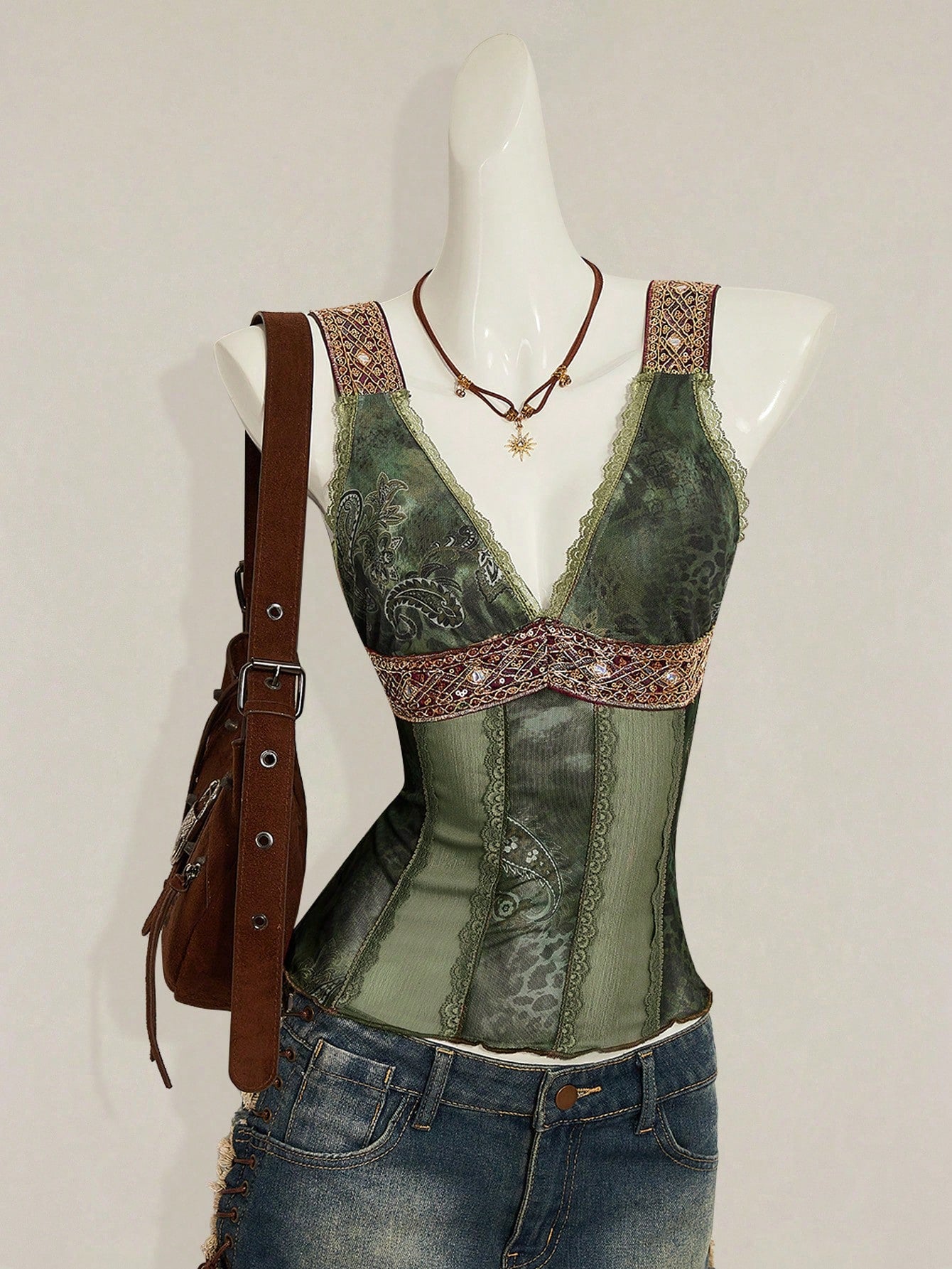 Women's Y2K fitted camisole with V-neckline, contrast lace patchwork, slim fit silhouette, backless design, and asymmetrical hem