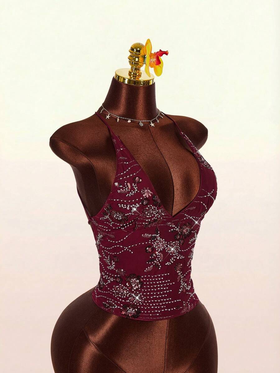 Women's embroidered sequin halter cami top featuring a deep V-neck, backless party design, and slim fit silhouette.