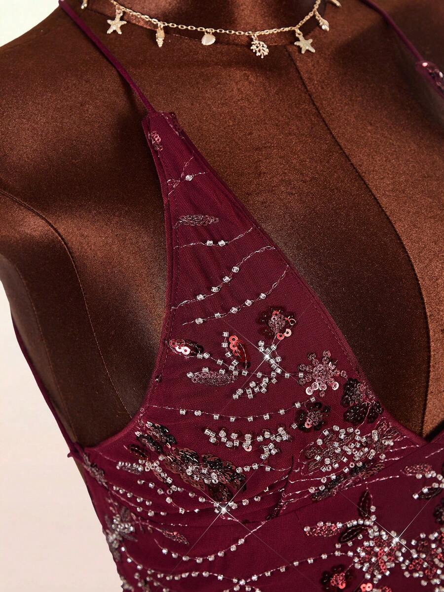Women's embroidered sequin halter cami top featuring a deep V-neck, backless party design, and slim fit silhouette.