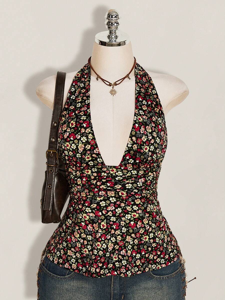 Women's backless halter babydoll tank top featuring a square neckline, slim fit silhouette, and a flared ruffle hem.