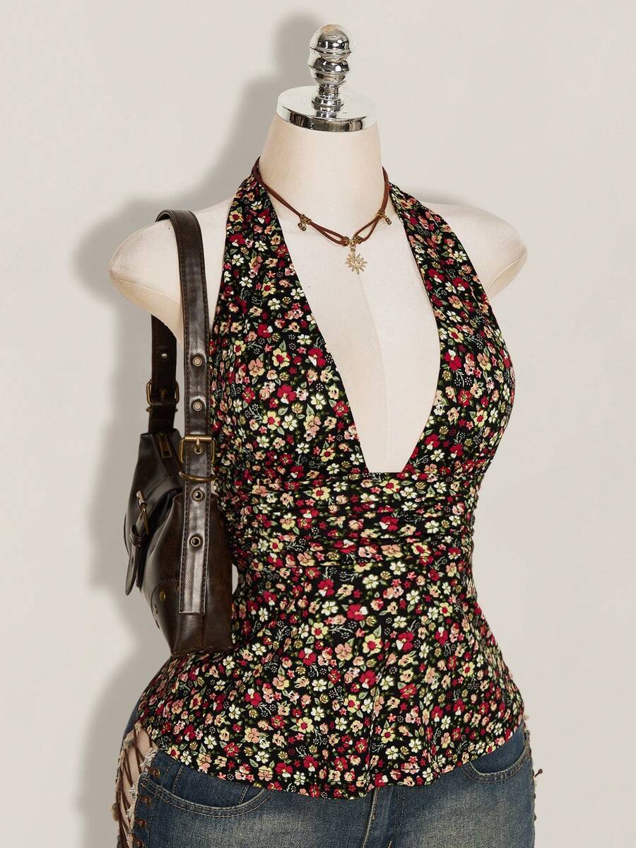 Women's backless halter babydoll tank top featuring a square neckline, slim fit silhouette, and a flared ruffle hem.