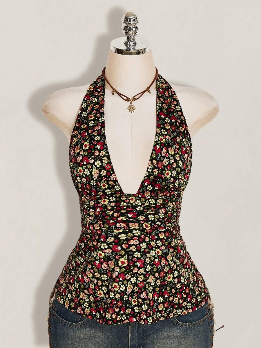 Women's backless halter babydoll tank top featuring a square neckline, slim fit silhouette, and a flared ruffle hem.