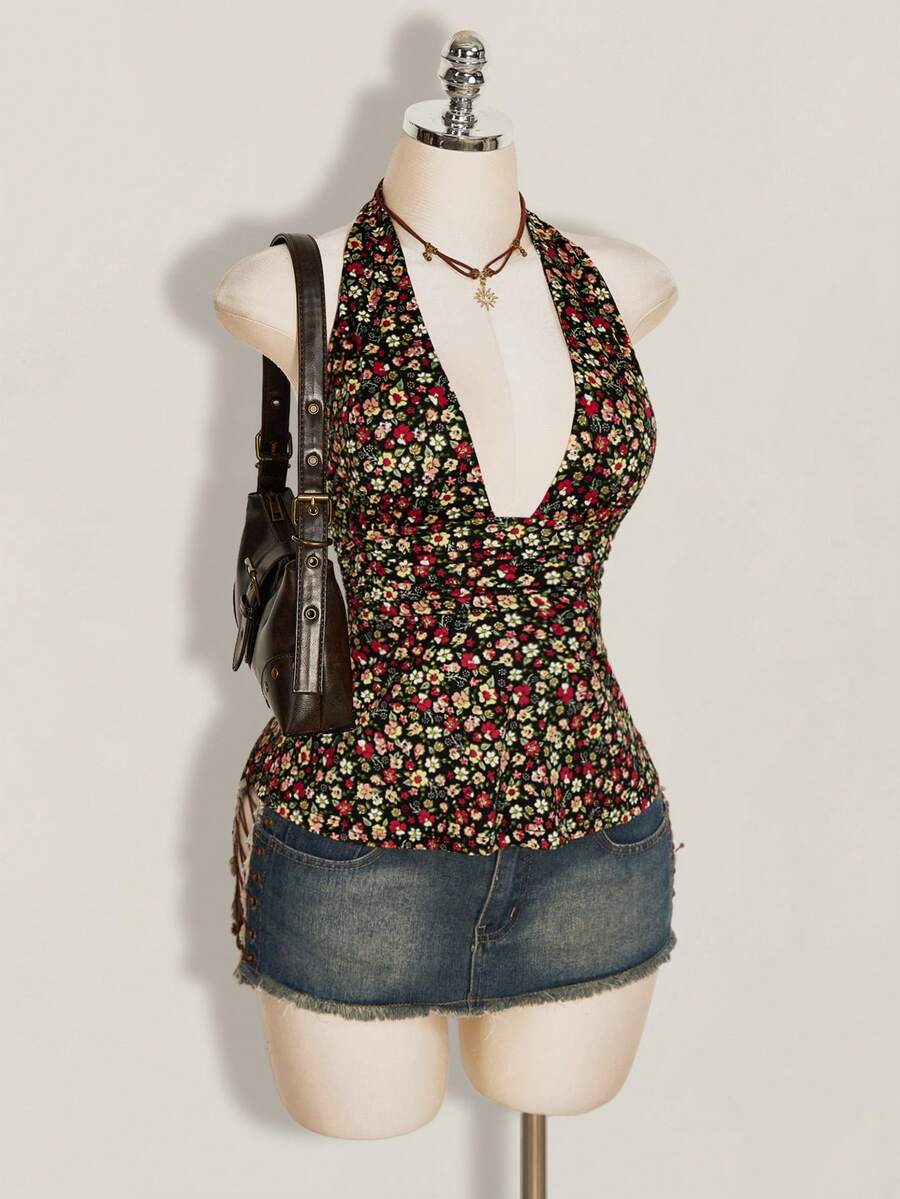 Women's backless halter babydoll tank top featuring a square neckline, slim fit silhouette, and a flared ruffle hem.