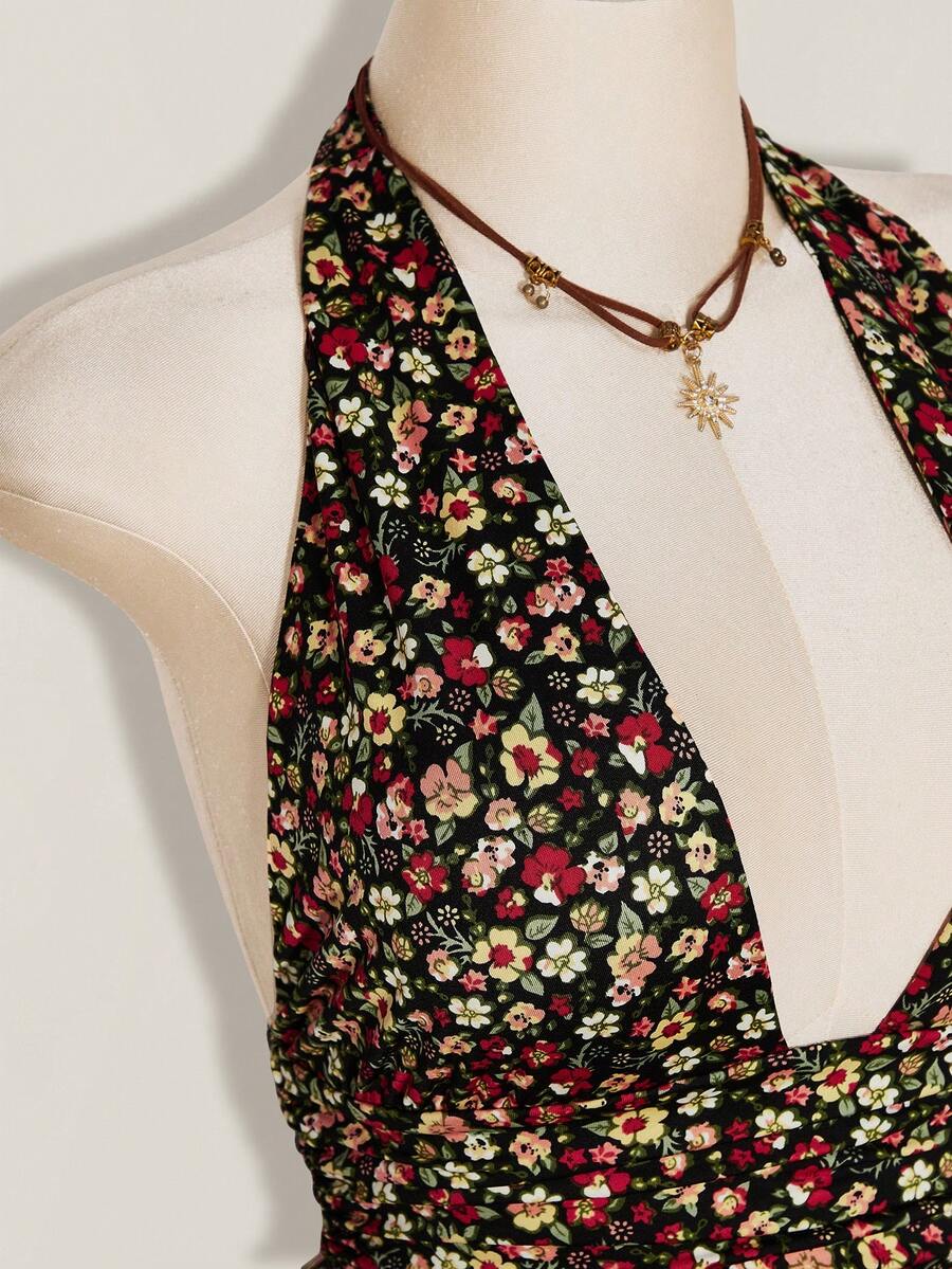 Women's backless halter babydoll tank top featuring a square neckline, slim fit silhouette, and a flared ruffle hem.