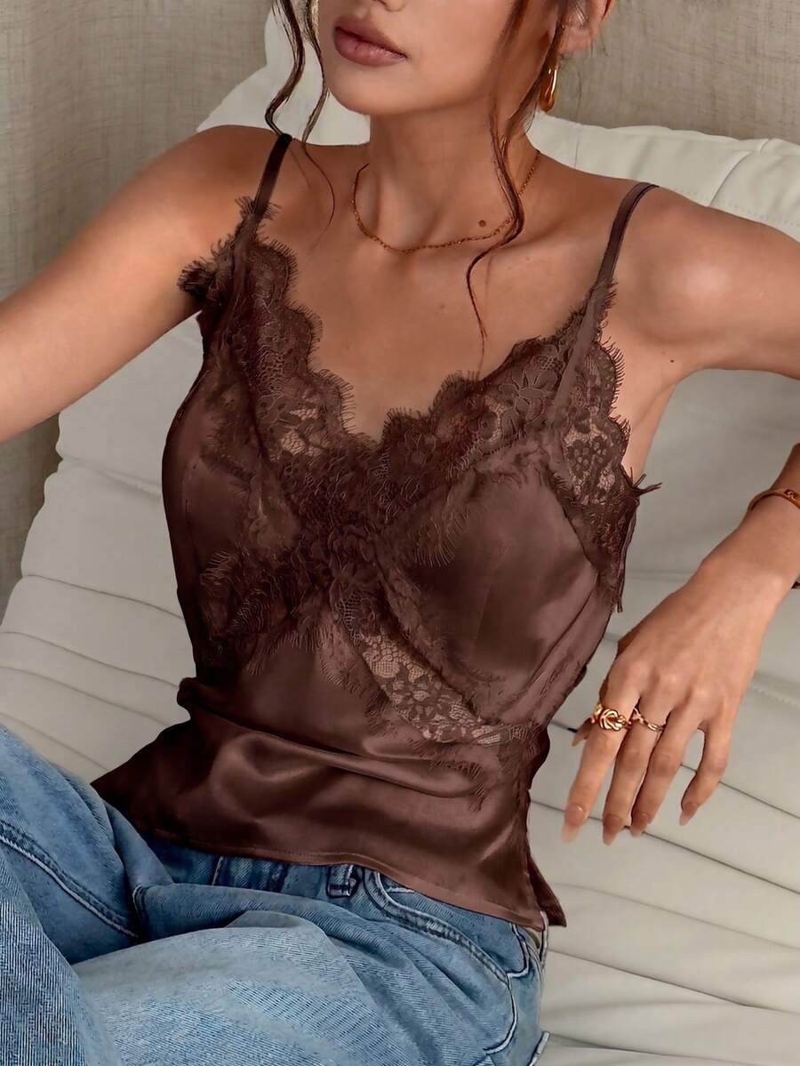 White satin design camisole tank top featuring contrast lace patchwork details and spaghetti straps.