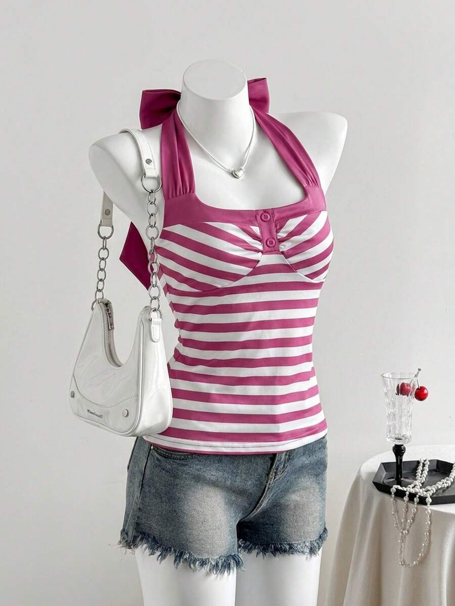 Women's multicolor striped halter top featuring a bow detail and slim fit design.