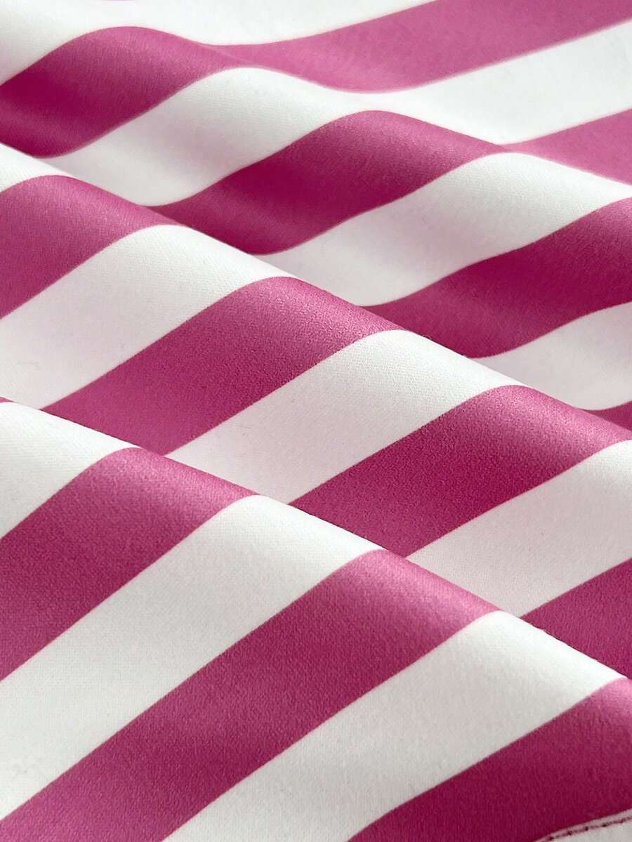 Women's multicolor striped halter top featuring a bow detail and slim fit design.