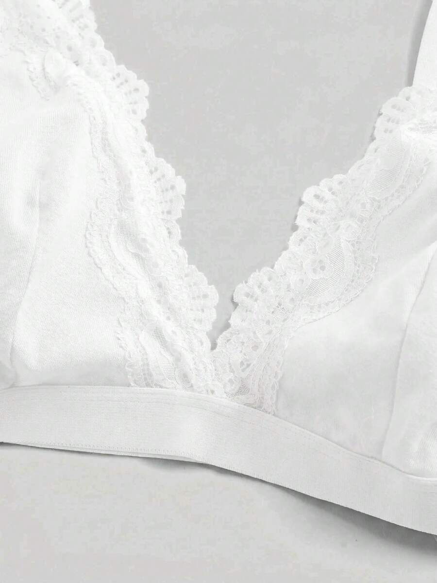 Women's deep V wireless bra with contrast scallop lace patchwork and adjustable straps in soft cotton knit fabric.