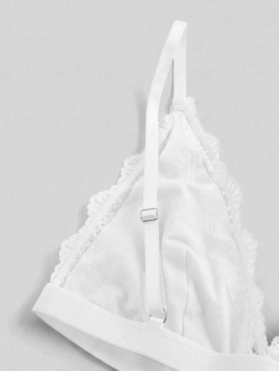 Women's deep V wireless bra with contrast scallop lace patchwork and adjustable straps in soft cotton knit fabric.