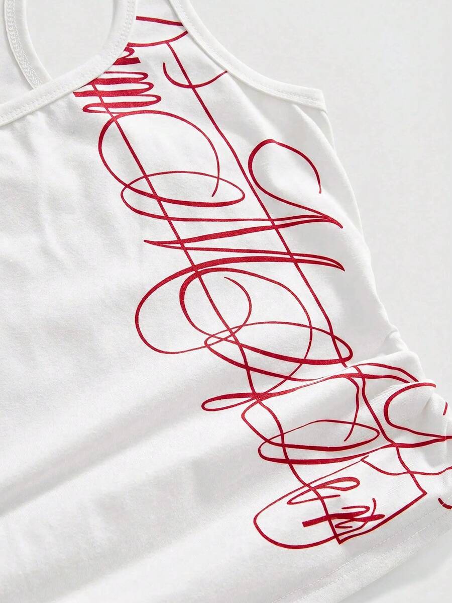 Punk-inspired two-piece set with a fitted scoop neck slogan tank top featuring cross and rhinestone details paired with ultra low waist mini shorts.