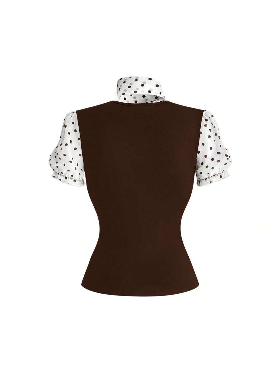 Women's black short puff sleeve graphic print t-shirt featuring a sweetheart neckline and knot detail.