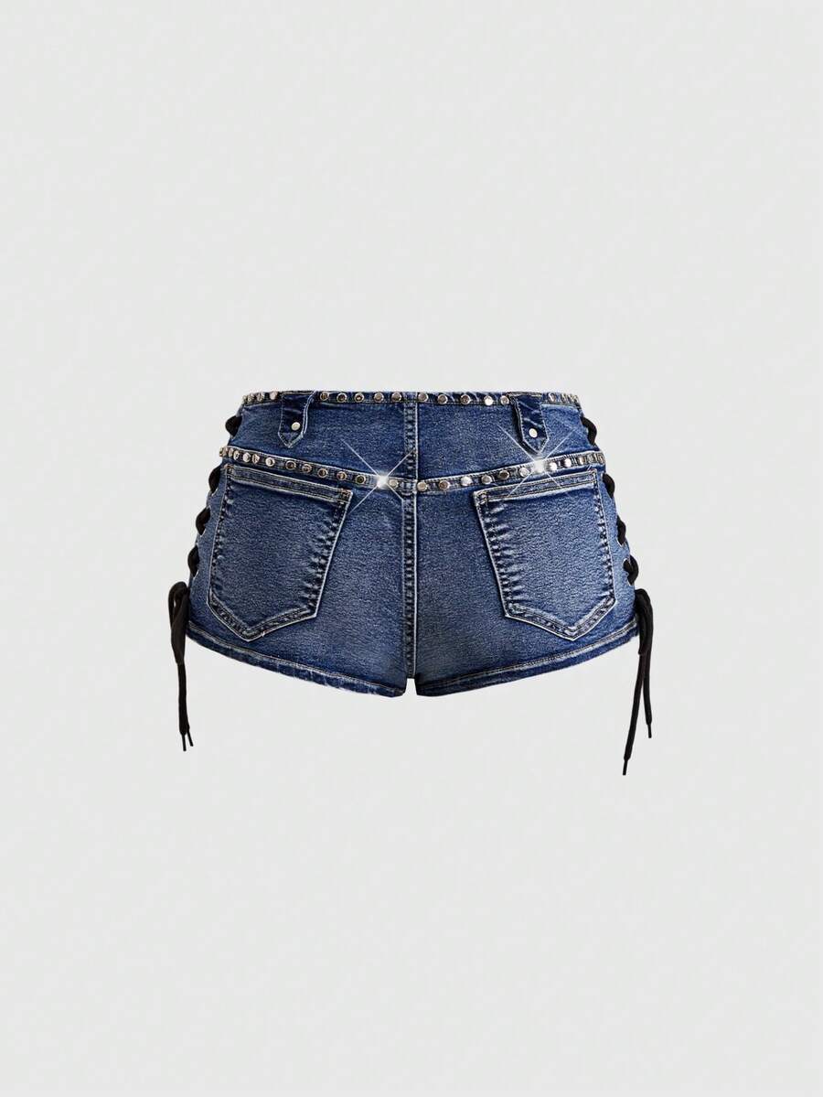 Women's low-rise studded denim mini shorts with a skinny fit and stretch fabric.