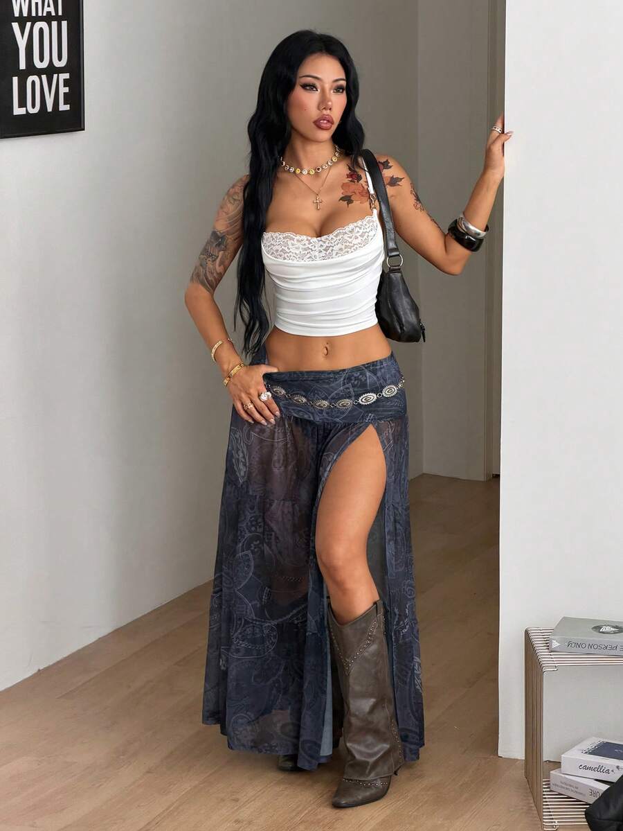 Women's floral split thigh long skirt in textured mesh fabric with a flared silhouette and low waist.