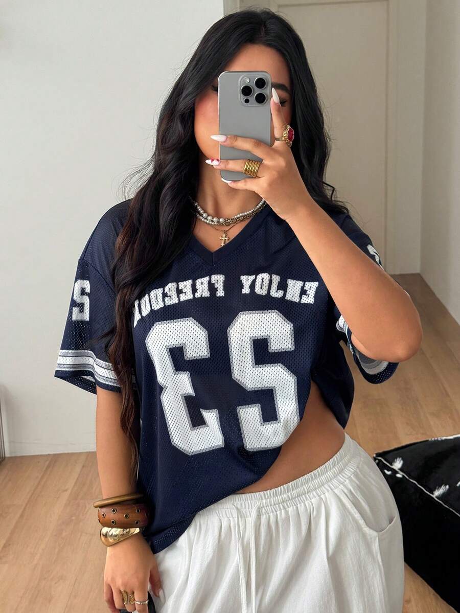 Navy blue plus size mesh baseball jersey t-shirt featuring a V-neck, raglan half sleeves, and sporty letter detailing.