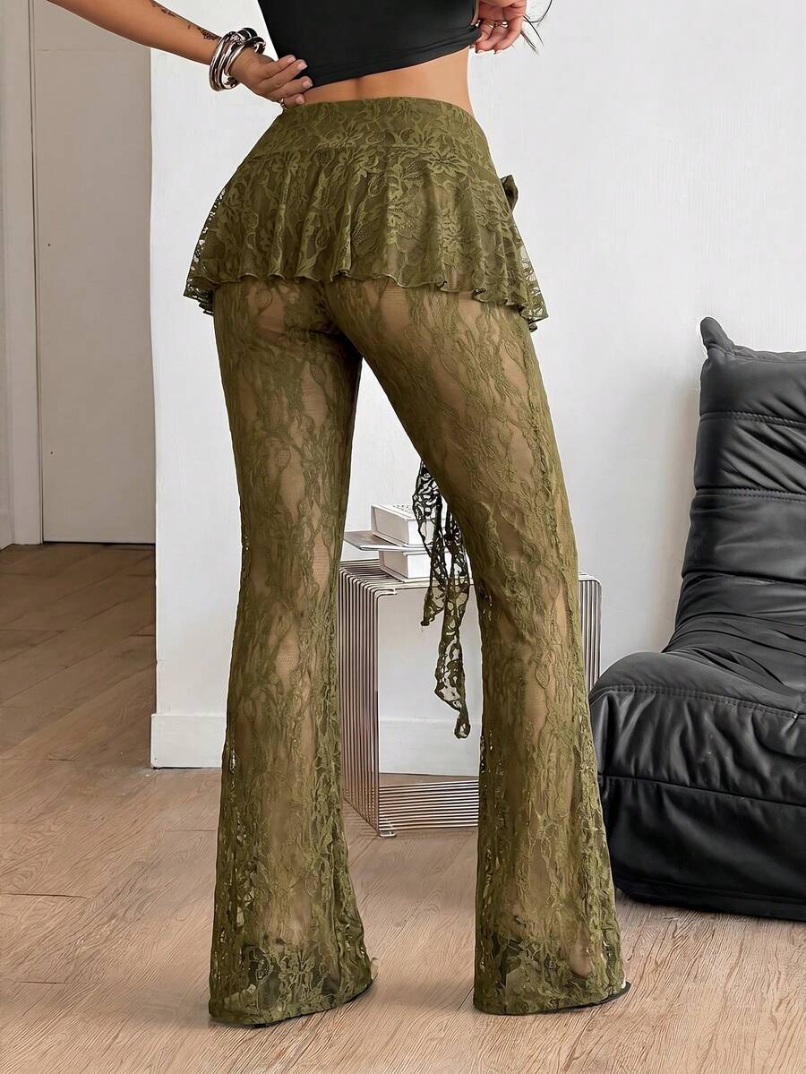 Black high-waist flare leg pants featuring contrast lace trim, floral ribbon detail, and semi-sheer knitted fabric.