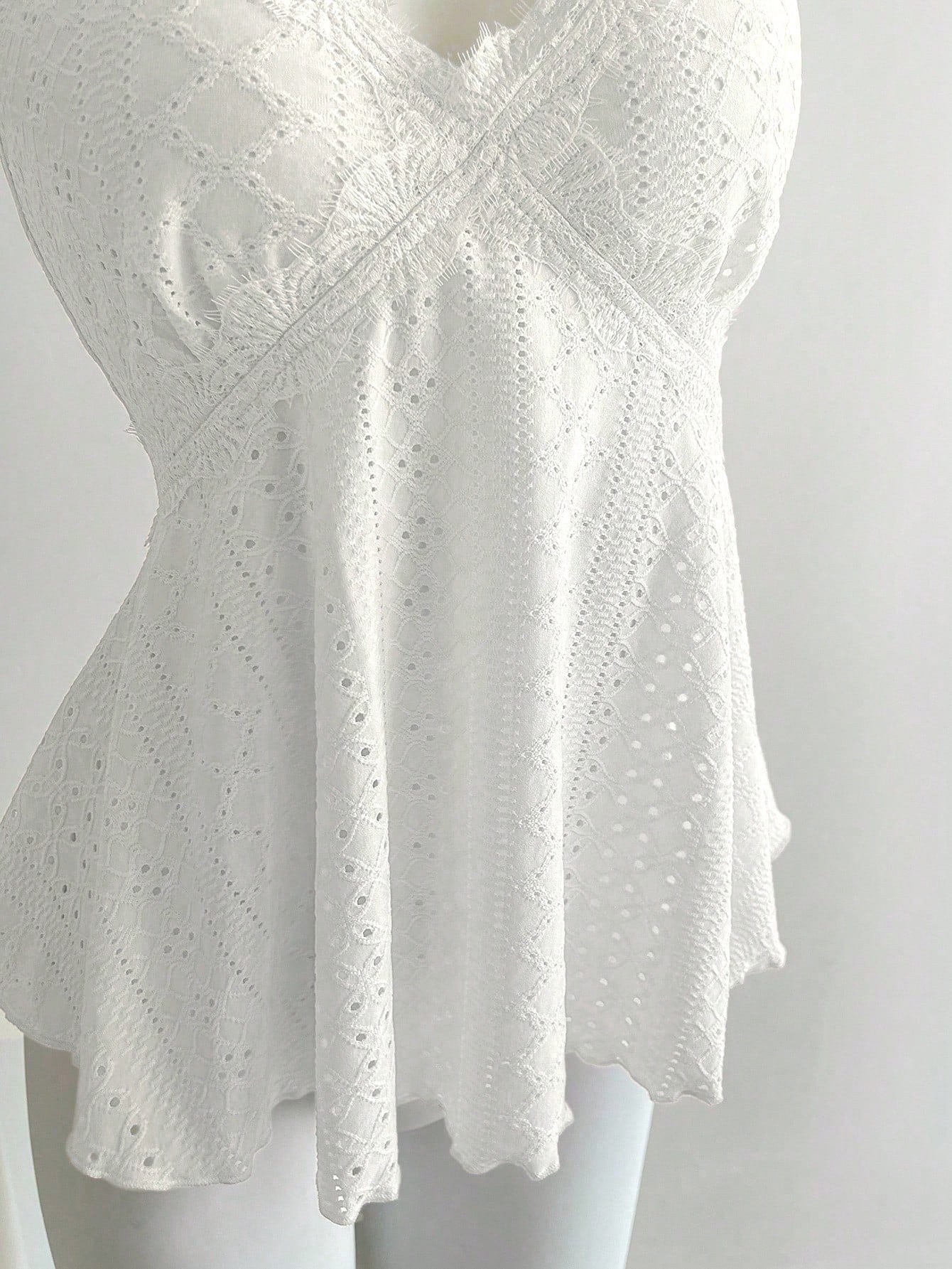 Women's halter crop camisole with textured detail, slim fit, and flared hem for beach vacation and spring or summer wear