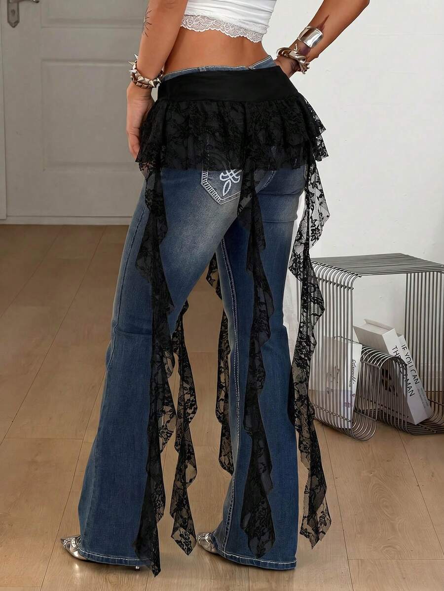 Women's black semi-sheer lace asymmetrical skirt with fringe details, contrast lace, low waist, and ruffle hem for beach, party, concert, or festival outfits.