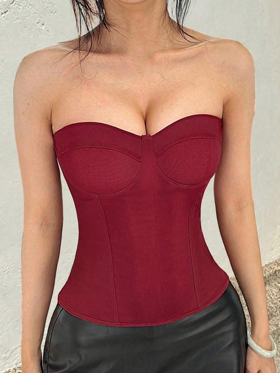 Solid color strapless corset tube top featuring a backless lace-up back design and cropped slim fit.