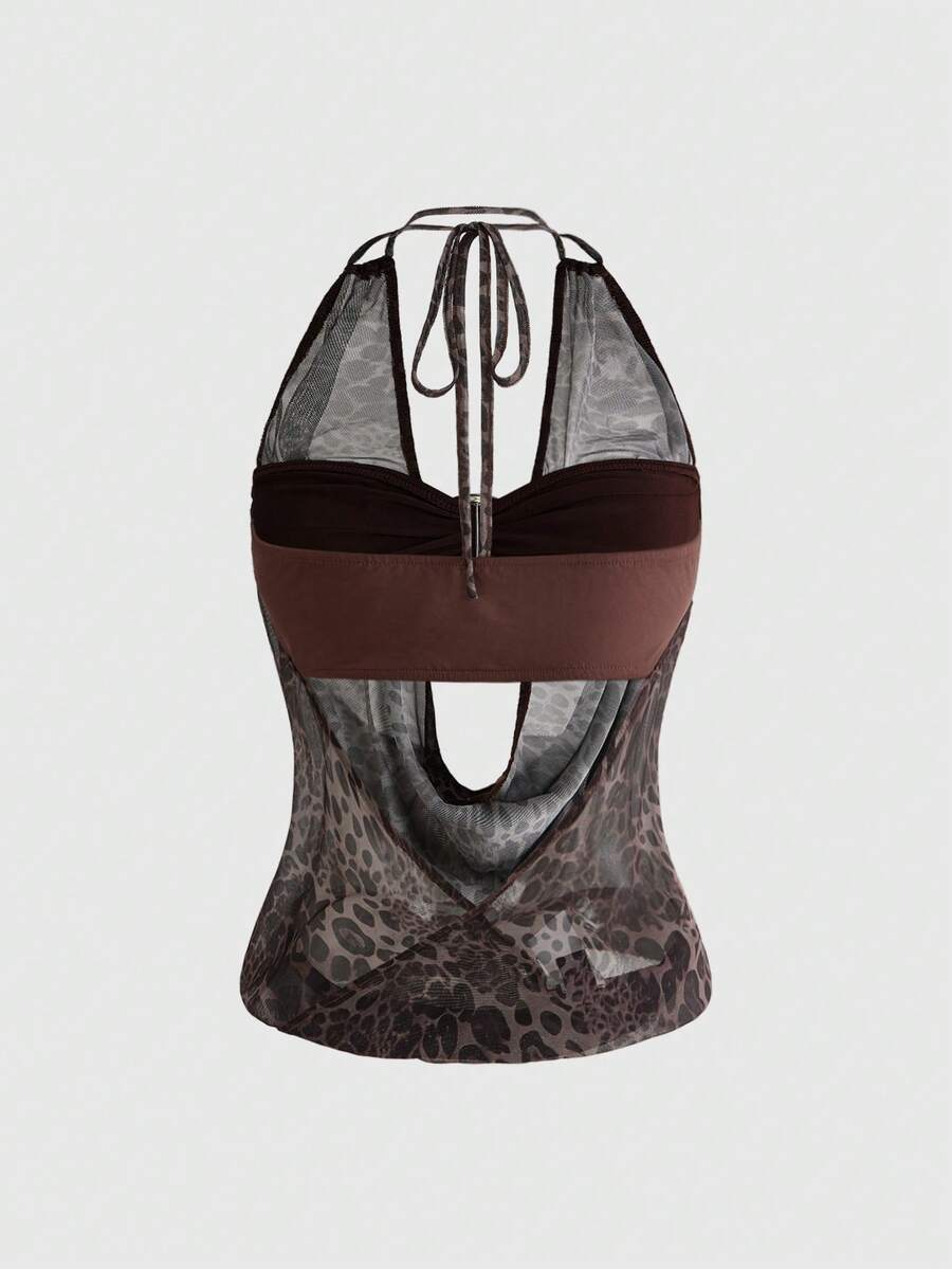 Women's Y2K retro crop tank top with draped halter neckline, cut-out detail, slim fit, and backless design